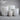 Driftsone Moku Planters with a raw, volcanic stone-inspired texture and a subtly curved base, finished in natural concrete