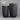 Black Fibrestone Sandhaven tall round tube pots with a sleek cylindrical shape and smooth matte finish, ideal for adding height and modern elegance to plant displays