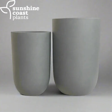 Grey Fibrestone Sandhaven tall round tube pots perfect for adding understated elegance to contemporary indoor or outdoor spaces