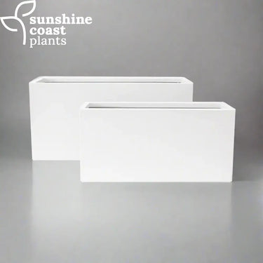 White rectangular Fibrestone Shoreline Troughs with smooth matte finishes and clean, modern edges